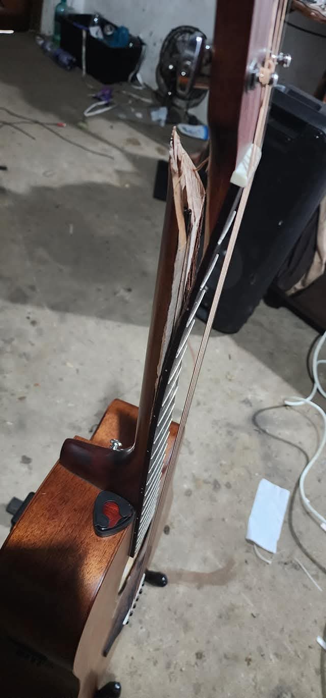 Snapped guitar neck before repair